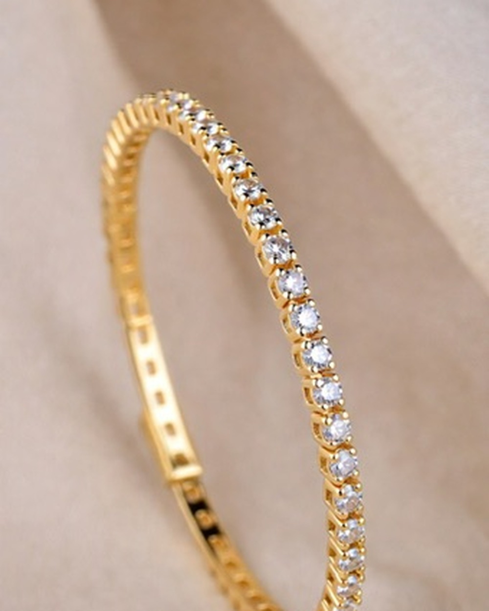 Eterna Gold Bangle — moissanite 14k gold vermeil bracelet, studio photograph on a clean background