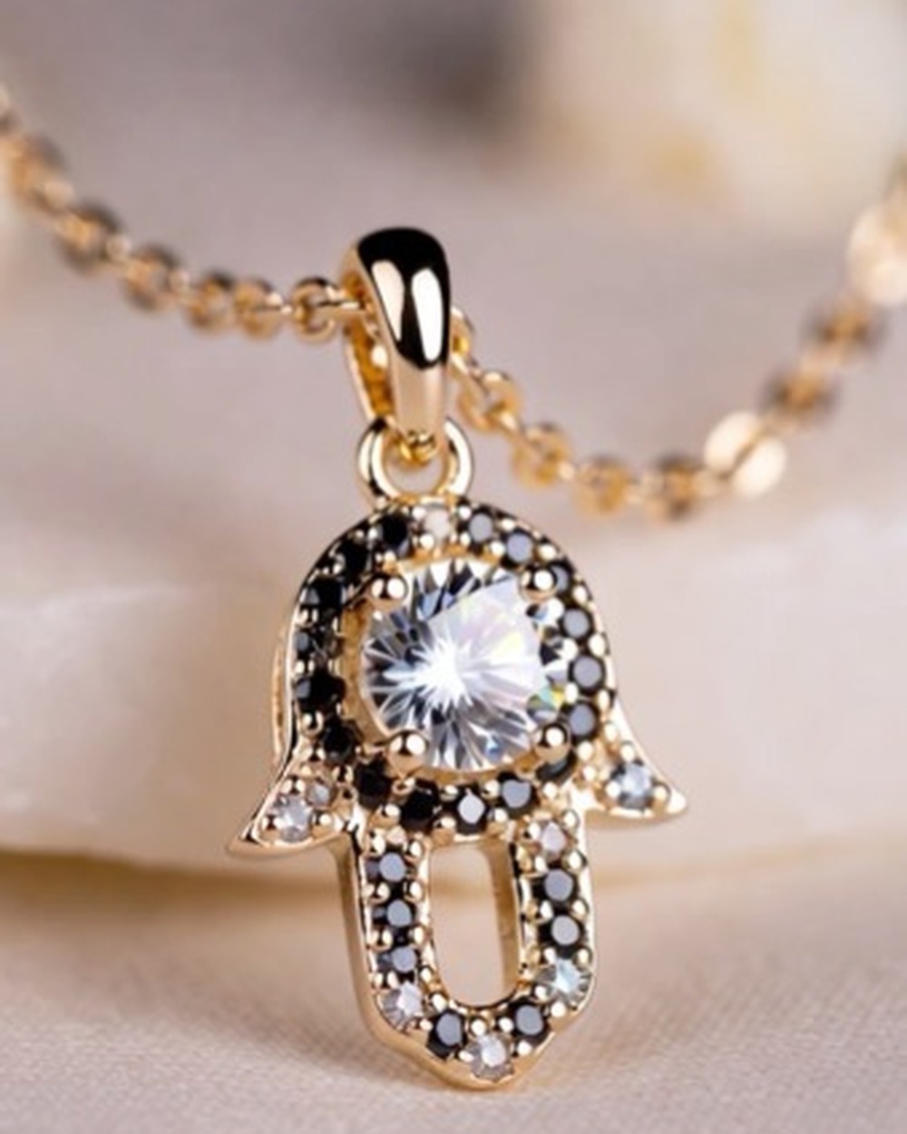 Hamsa Guardian Pendant — moissanite 14k gold vermeil pendant, studio photograph on a clean background