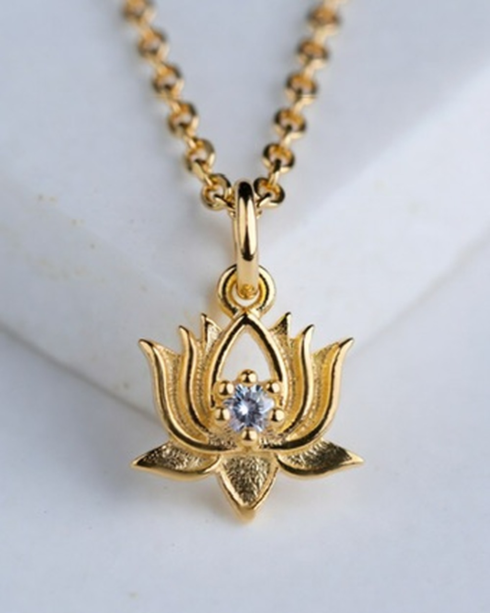Loto Lotus Pendant — moissanite 14k gold vermeil pendant, studio photograph on a clean background