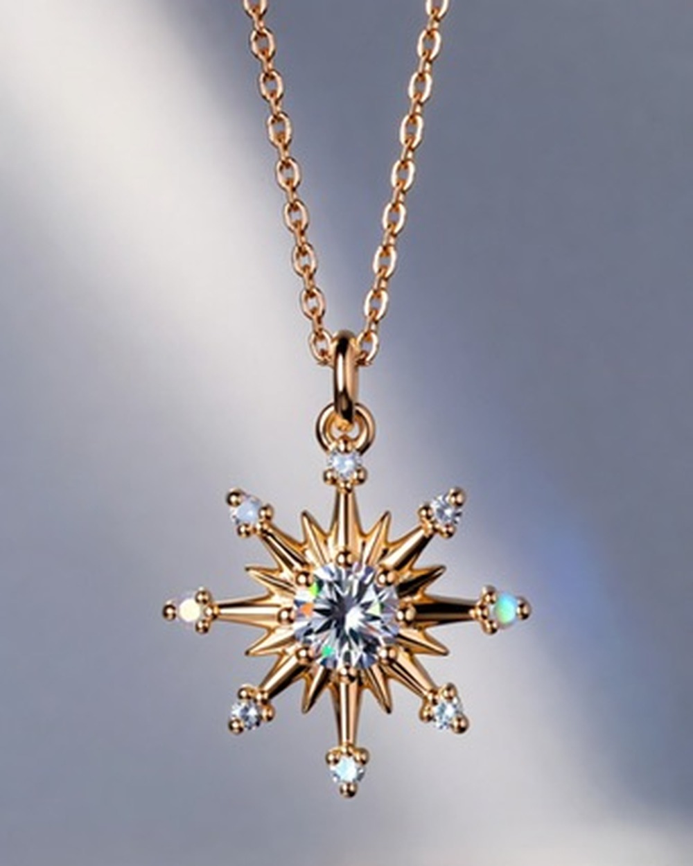 Stella Talisman Necklace — moissanite 14k gold vermeil pendant, studio photograph on a clean background